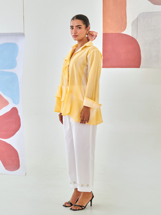 Yellow check asymmetric shirt with floral embroidery white pants